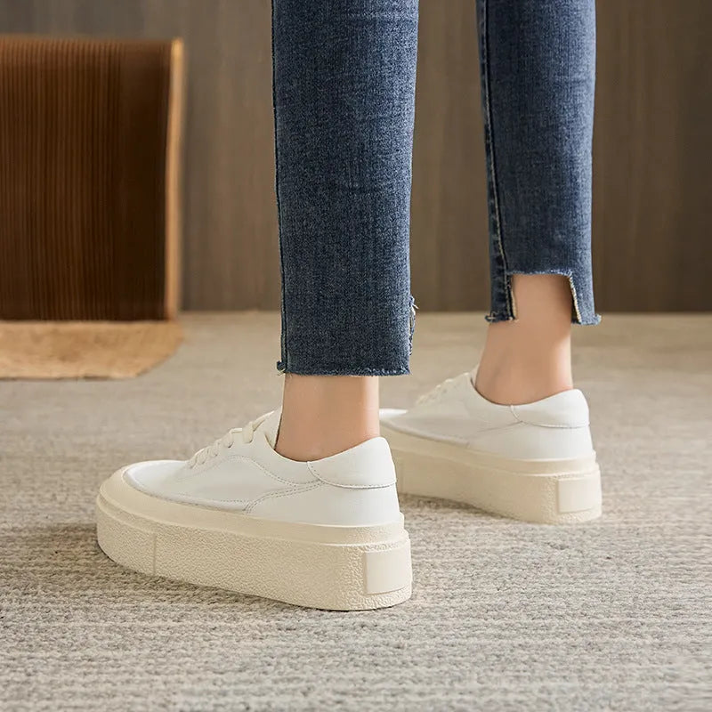 Women's black platform sports board shoes with embossed cowhide upper and tie fastening
