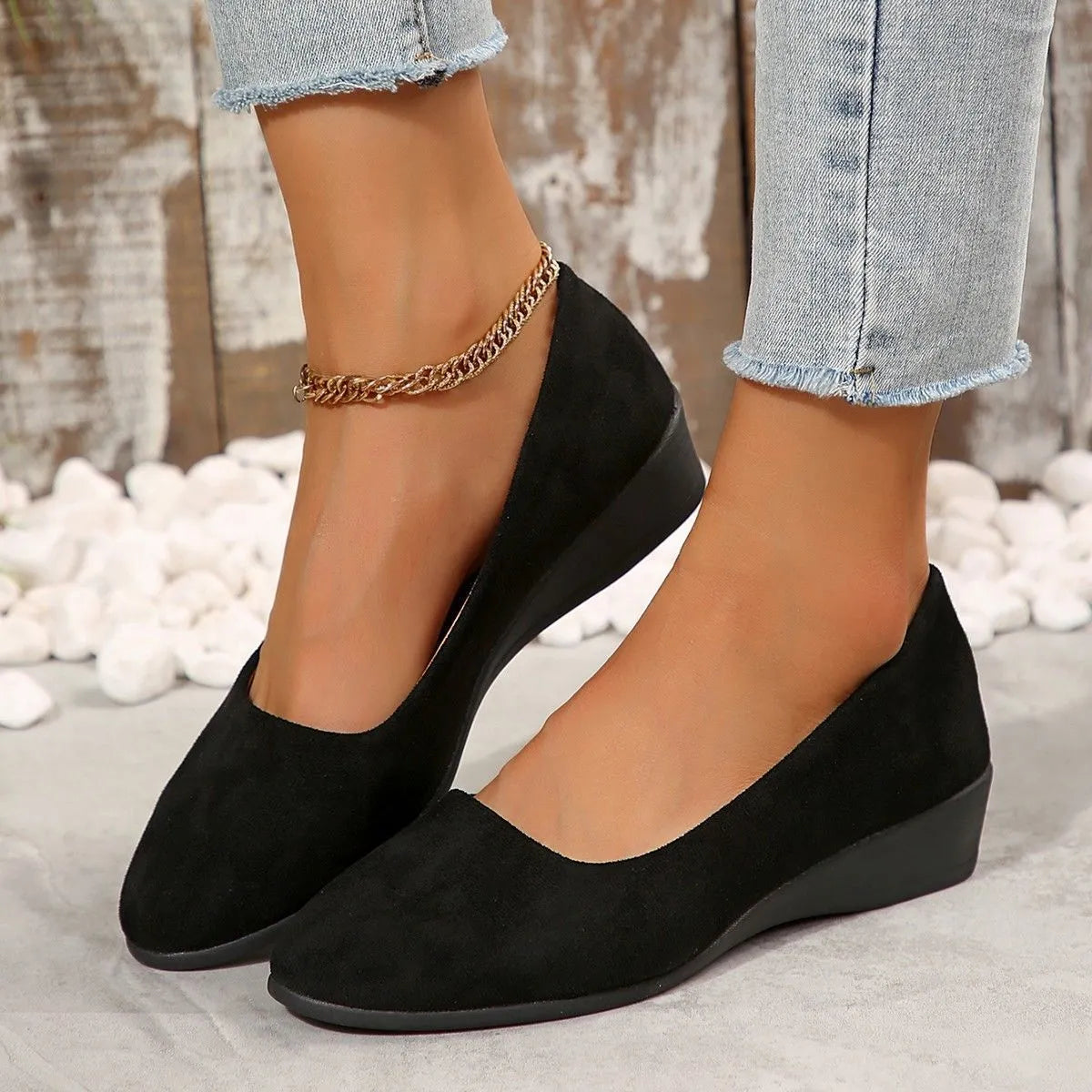 Women's pointed toe wedge pumps with suede upper and shallow mouth cut in light brown