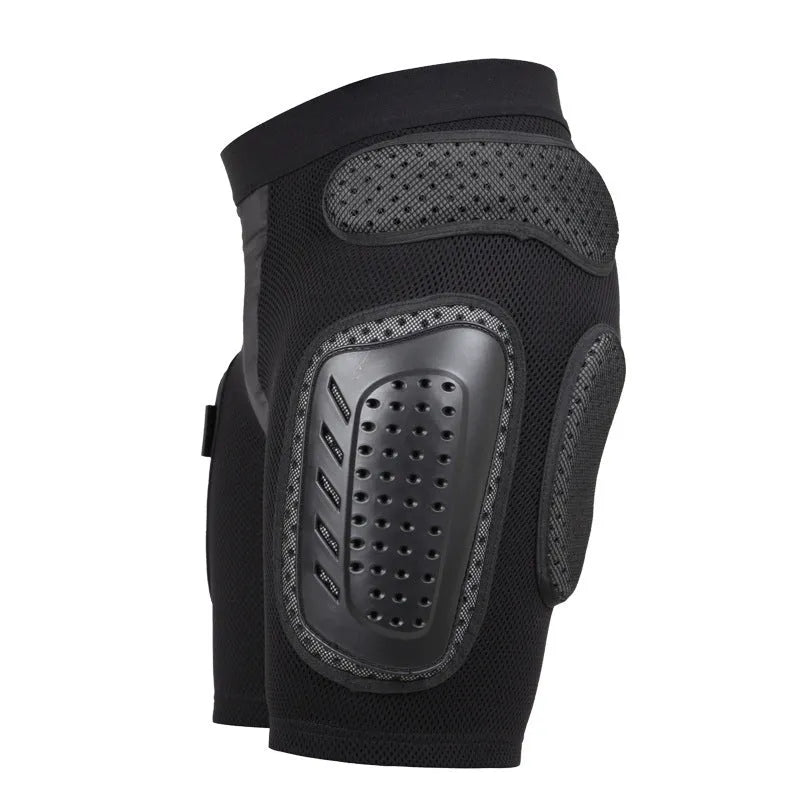 Black cycling hip protection pants showing padded construction for impact safety during mountain biking.