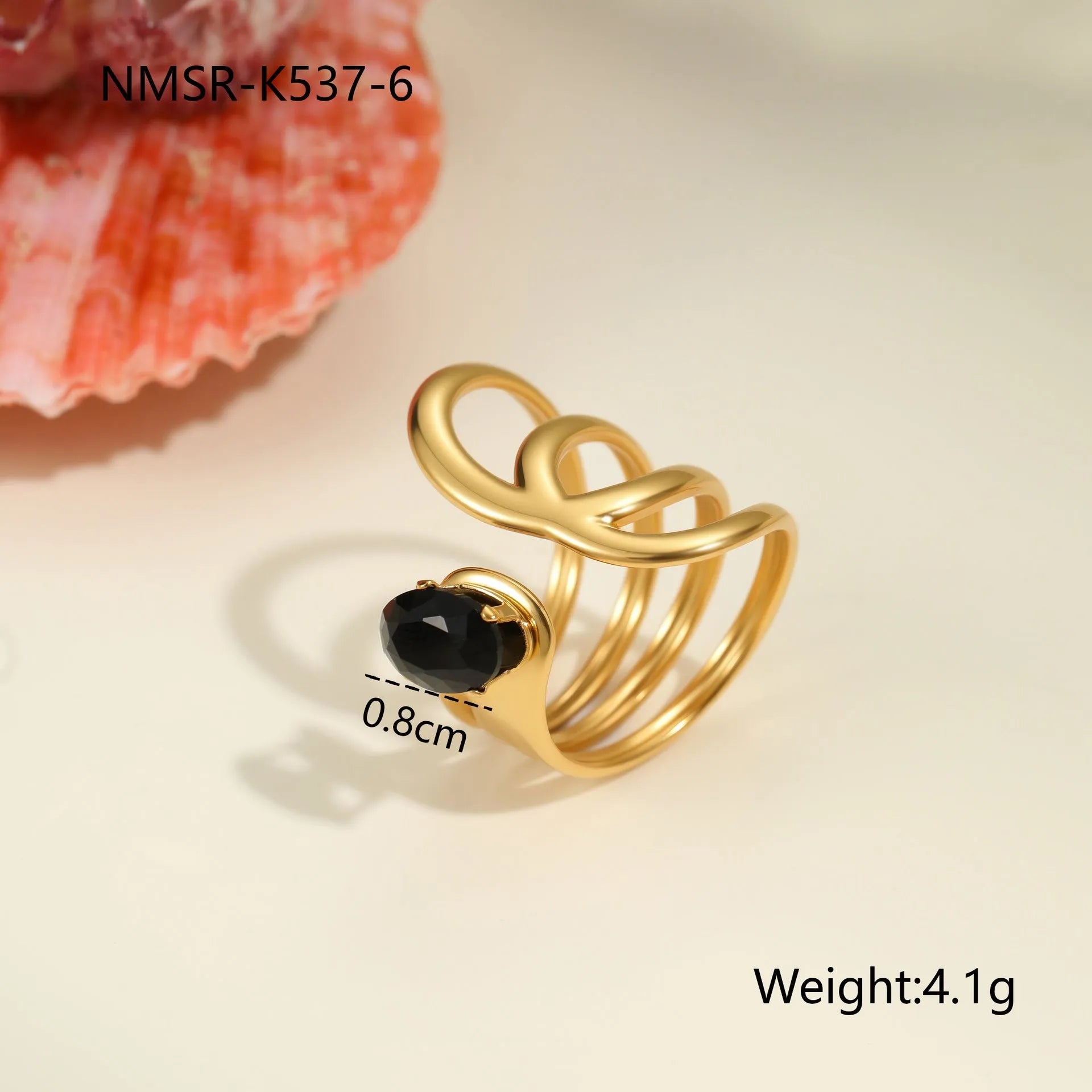 Geometric open mouth titanium steel ring for women on a plain background.