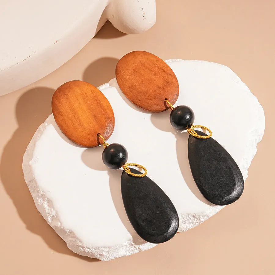 Retro wooden earrings in silver brown black colour with elliptical shape and European style