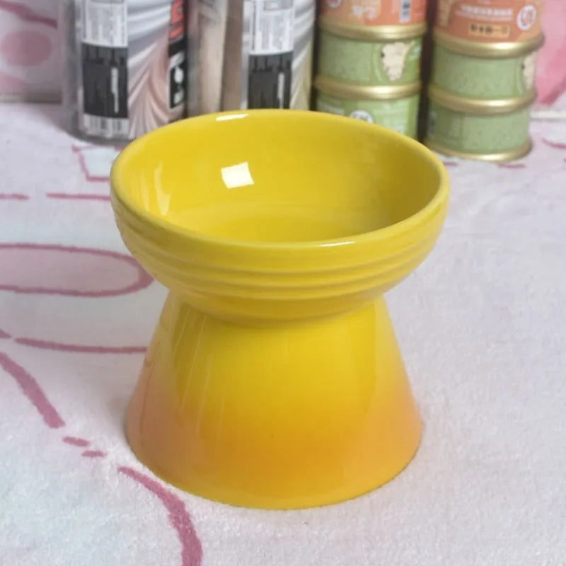 Ceramic pet bowl with anti-tumble design and raised chin support for cats and dogs