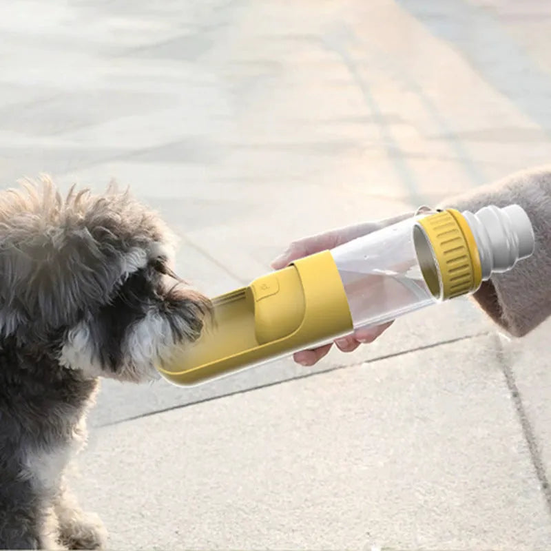 Portable dark blue dog water bottle with integrated drinking bowl and leak-proof cap.