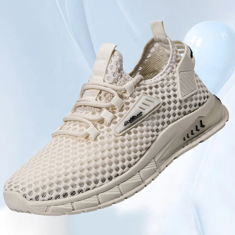 Men's beige casual sneakers with mesh lining, synthetic leather upper, and lace-up front closure