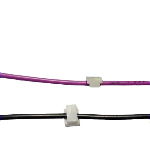 Black PA66 nylon cable management clip for automotive and electronic wiring.