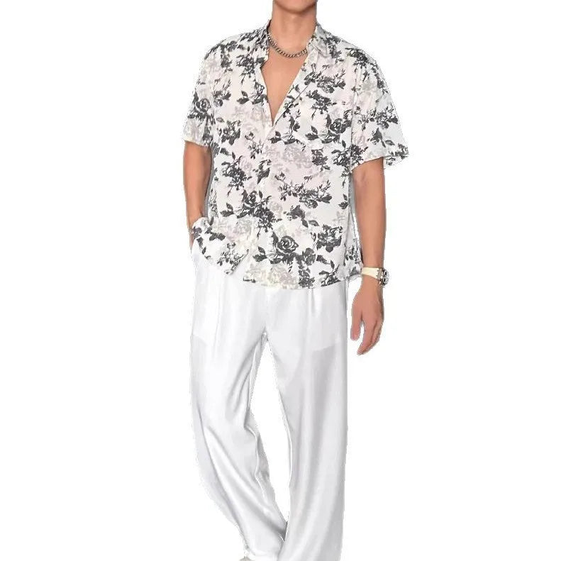Loose casual short sleeve shirt with floral pattern in black or white colour options