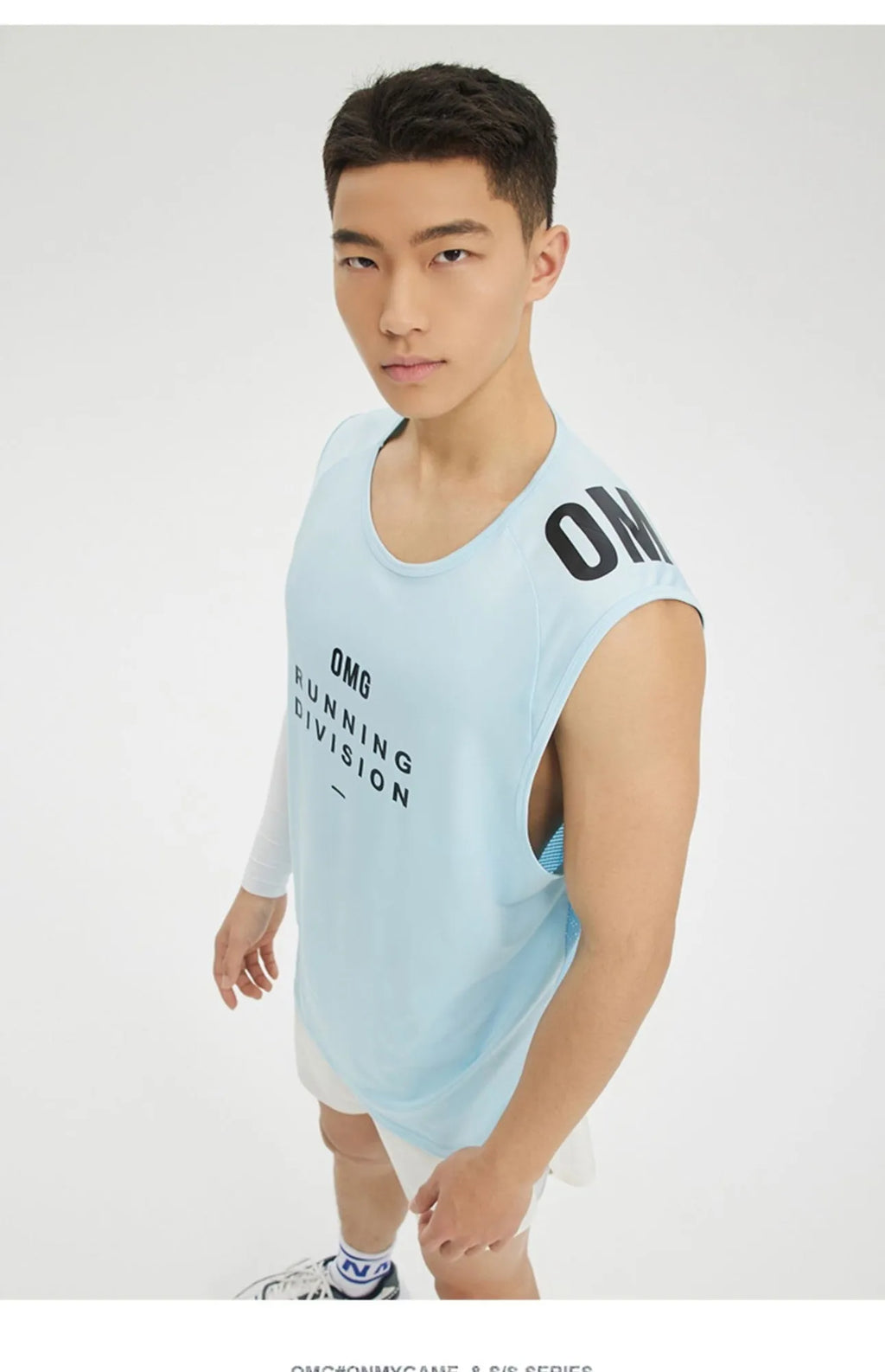 Men's loose fit mesh sports vest in black, shown front view.