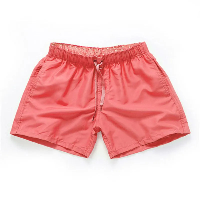 Men's straight leg beach shorts in multiple colours, made from polyester fabric, shown on size chart from S to 4XL.