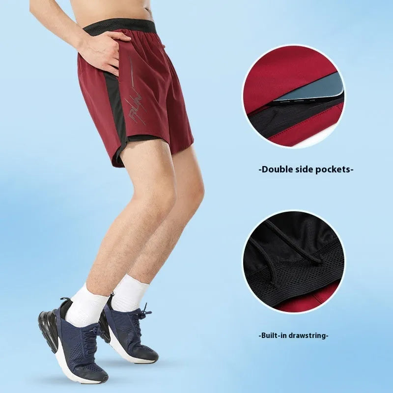 Men's solid colour low-waist basketball shorts made from polyester fabric.