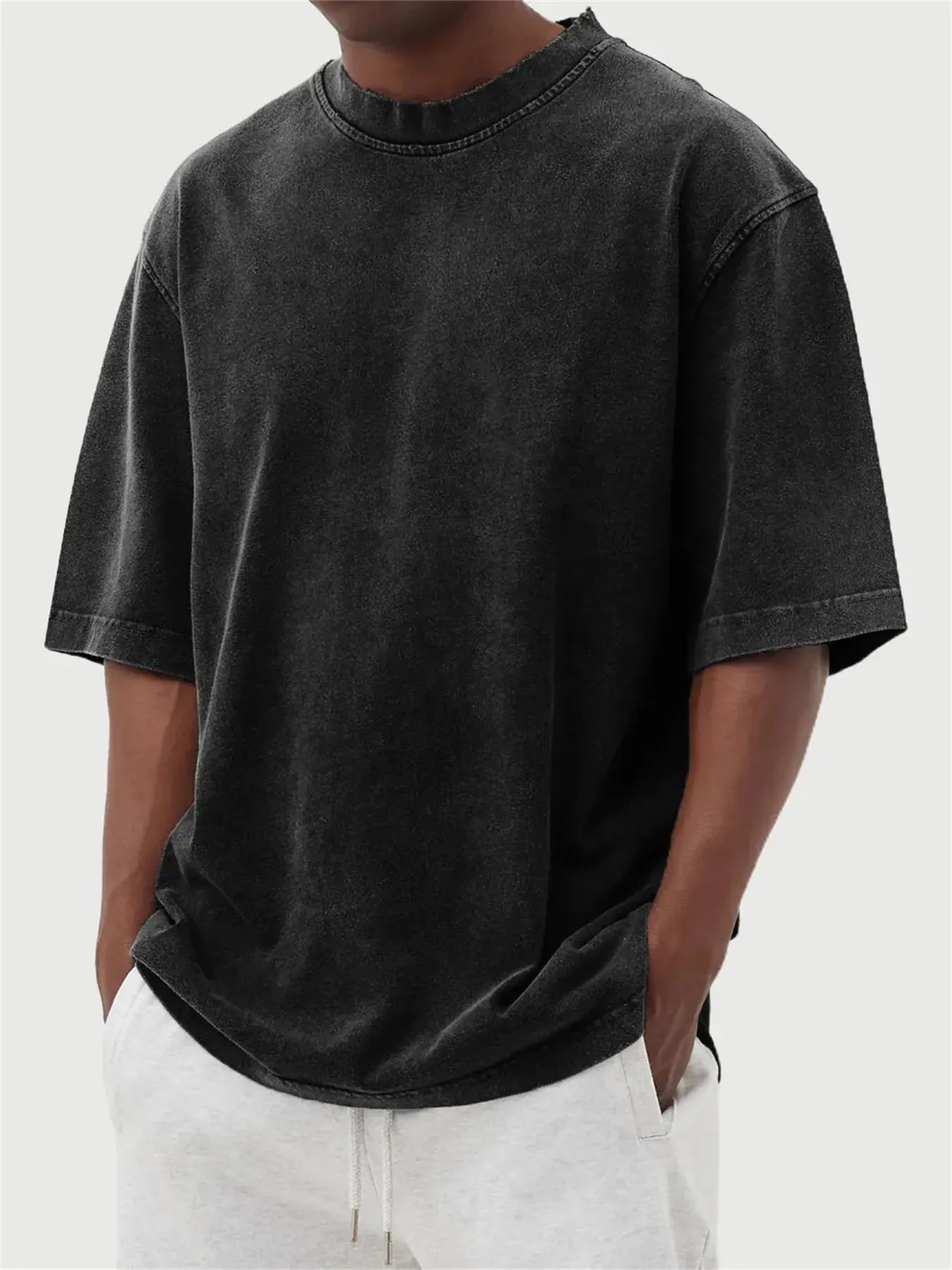 Men's stone washed distressed pullover t-shirt in loose fit with half sleeves available in eight colours