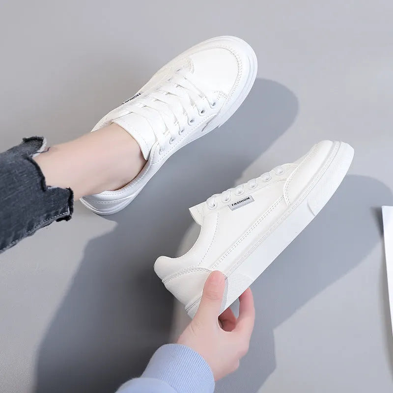 Korean style low-top sneakers in white and brown colours with artificial PU upper