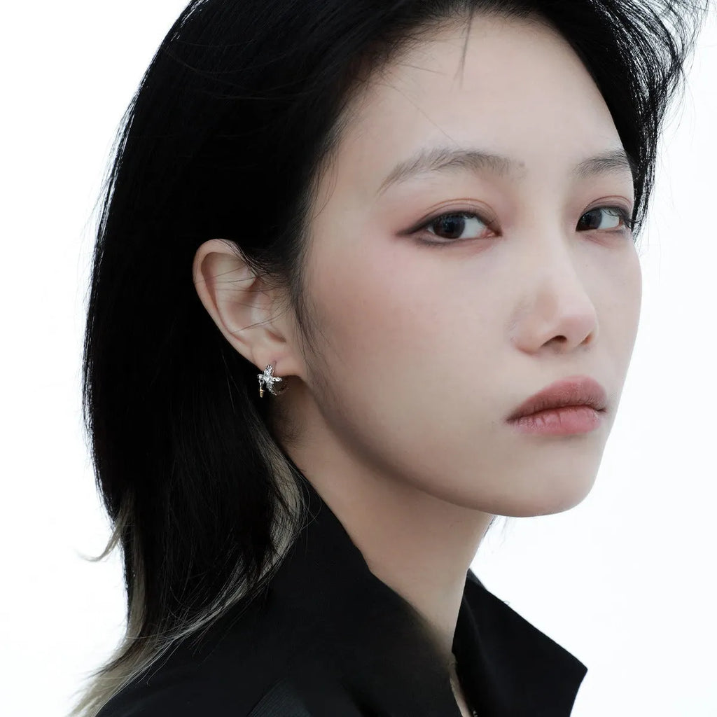XINGX cross earrings in 925 silver with geometric circular design and white gold colour finish