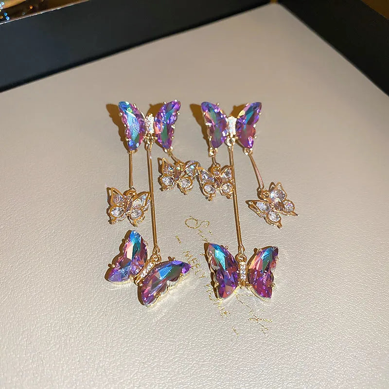 Silver needle crystal flowers butterfly tassel earrings with blue purple electroplated finish
