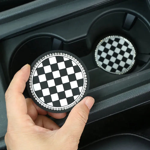 PVC non-slip car cup holder coaster mat in a black and white checkerboard pattern