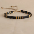 Geometric beaded pull-on bracelet in milky white, black, green, blue, or red colours