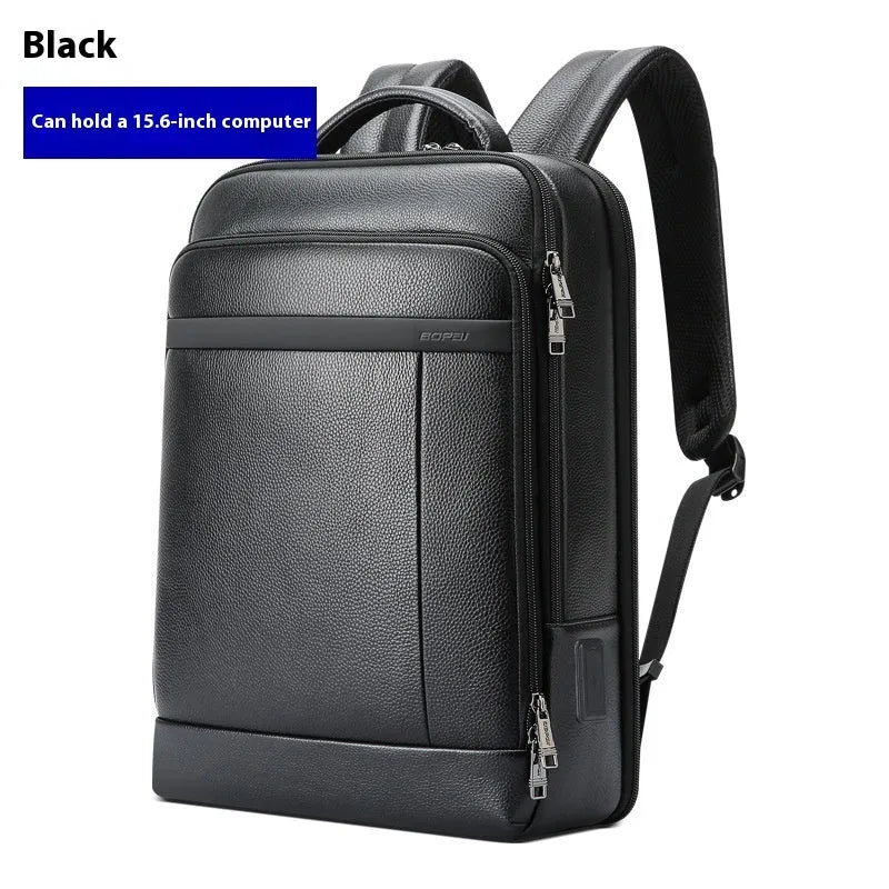Black cowhide leather business backpack with curved shoulder straps and USB charging port