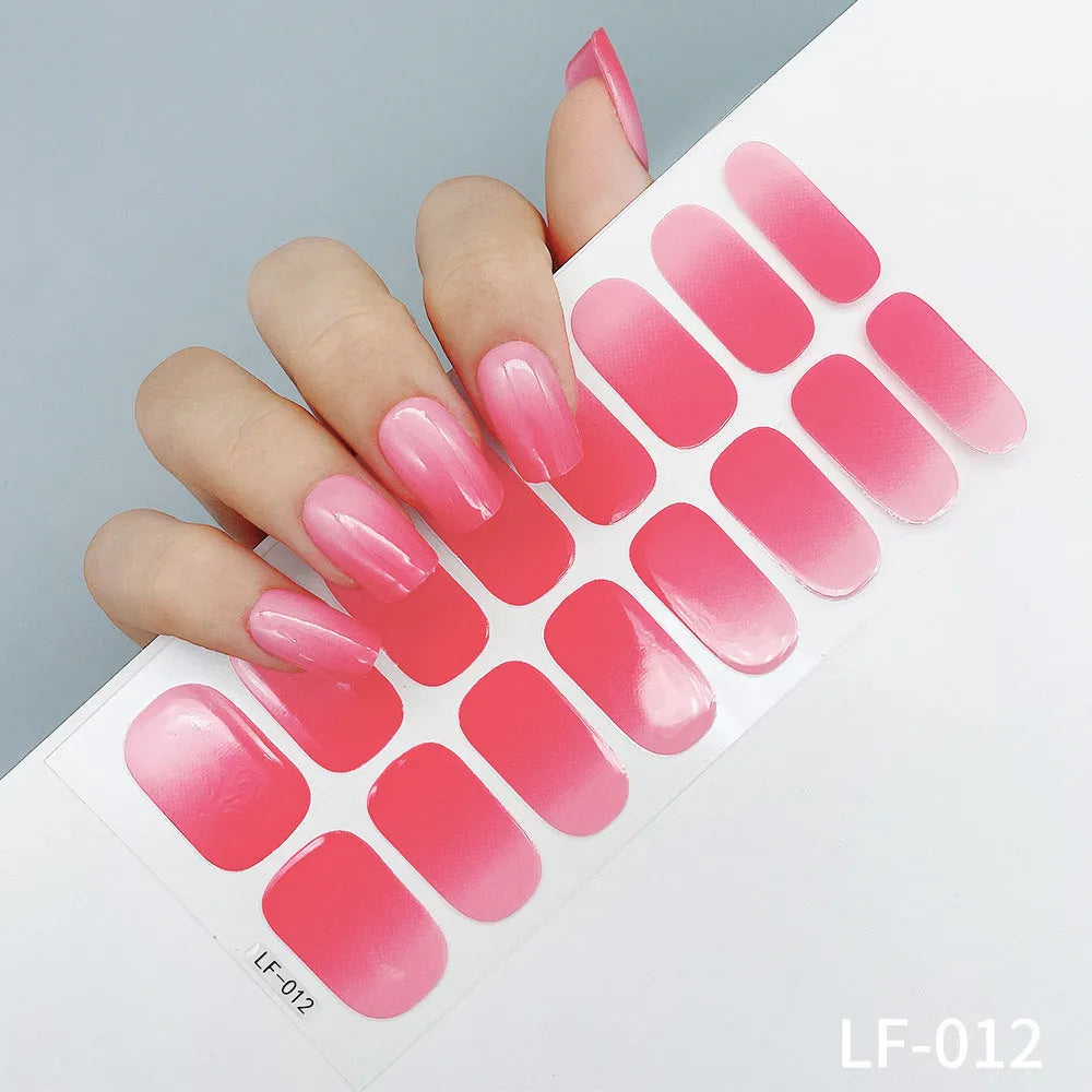 Sheet of 16 solid colour nail art sticker designs including cross, rose, and leopard print patterns.