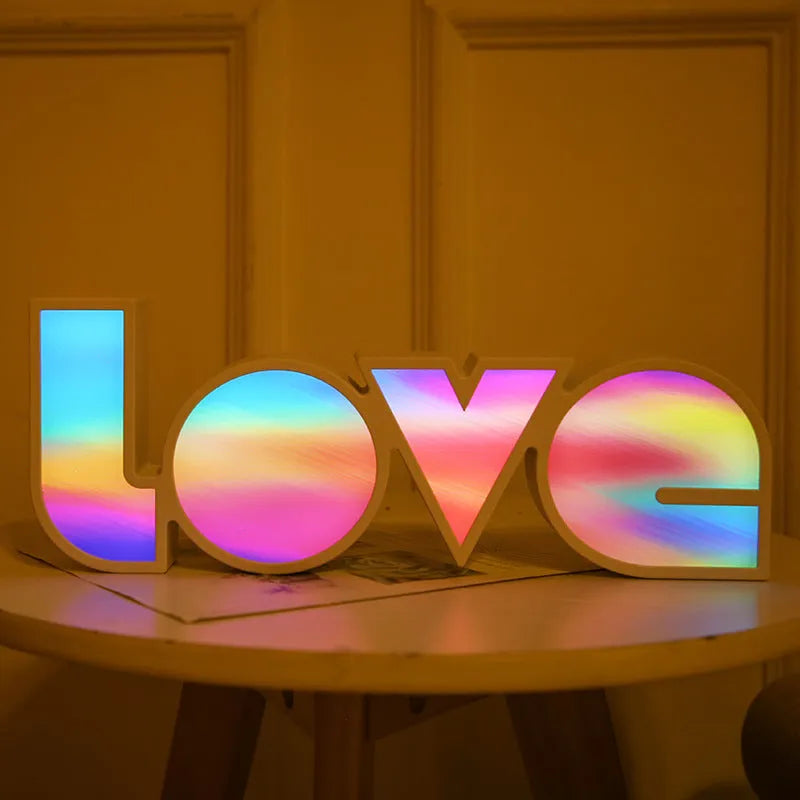 Rainbow style LED LOVE light decoration with plastic shell measuring 35.5cm by 13.5cm