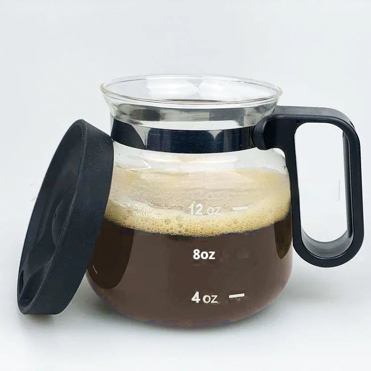 Transparent borosilicate glass coffee maker with blue silicone cover for pour-over brewing