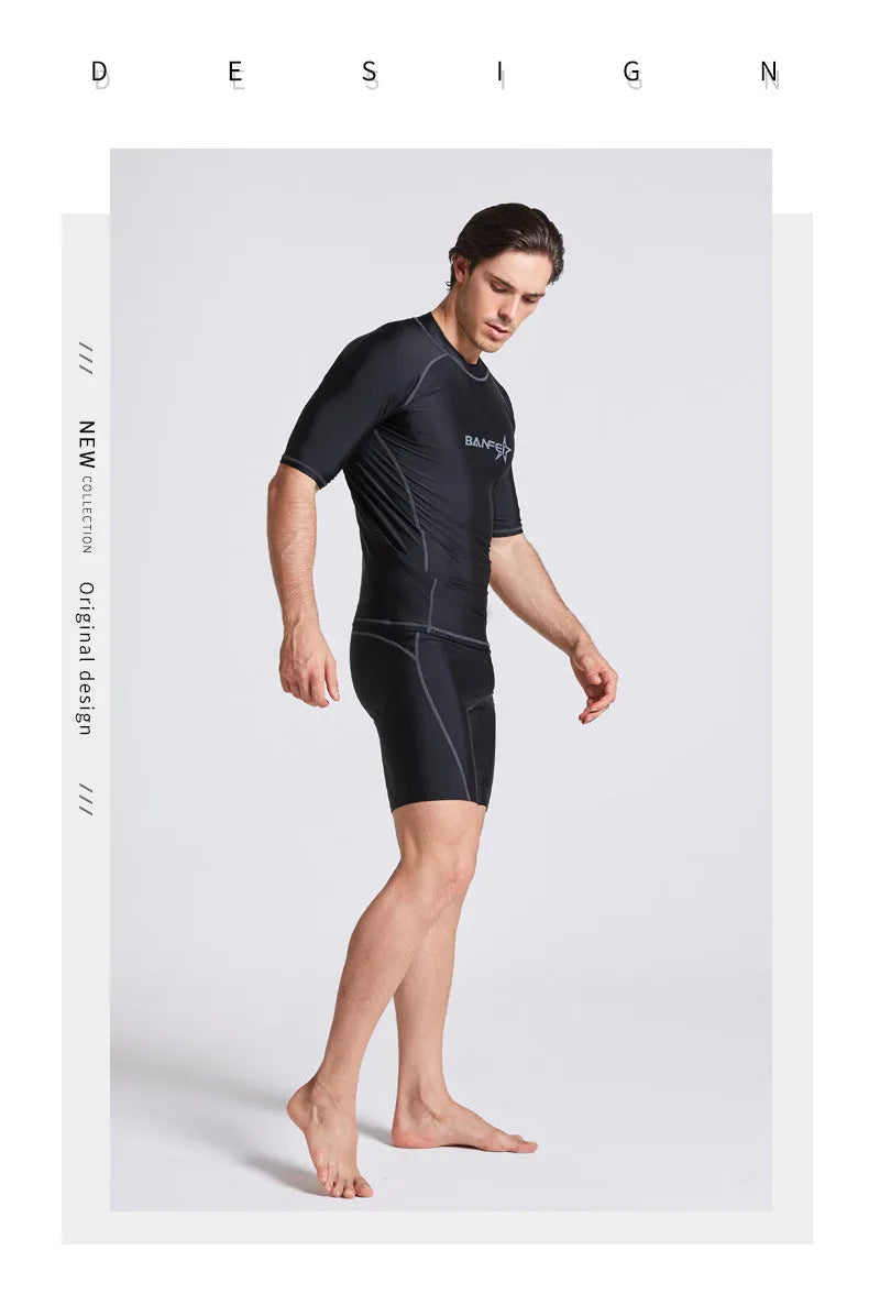 Men's quick-drying half sleeve swim suit with separate swim top and pants in navy blue.