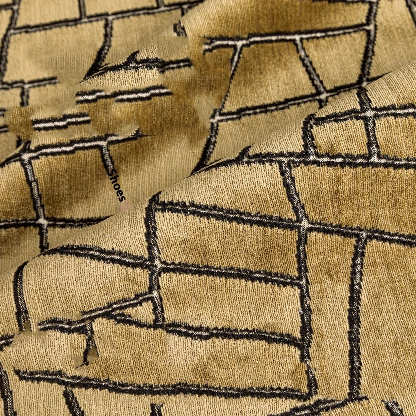 Geometric abstract pattern cushion cover in gold colour on polyester feather velvet fabric