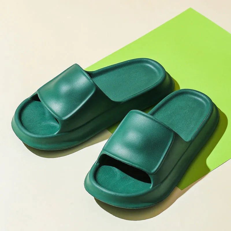 Thick sole EVA flip flop slippers in multiple colours on a white background.