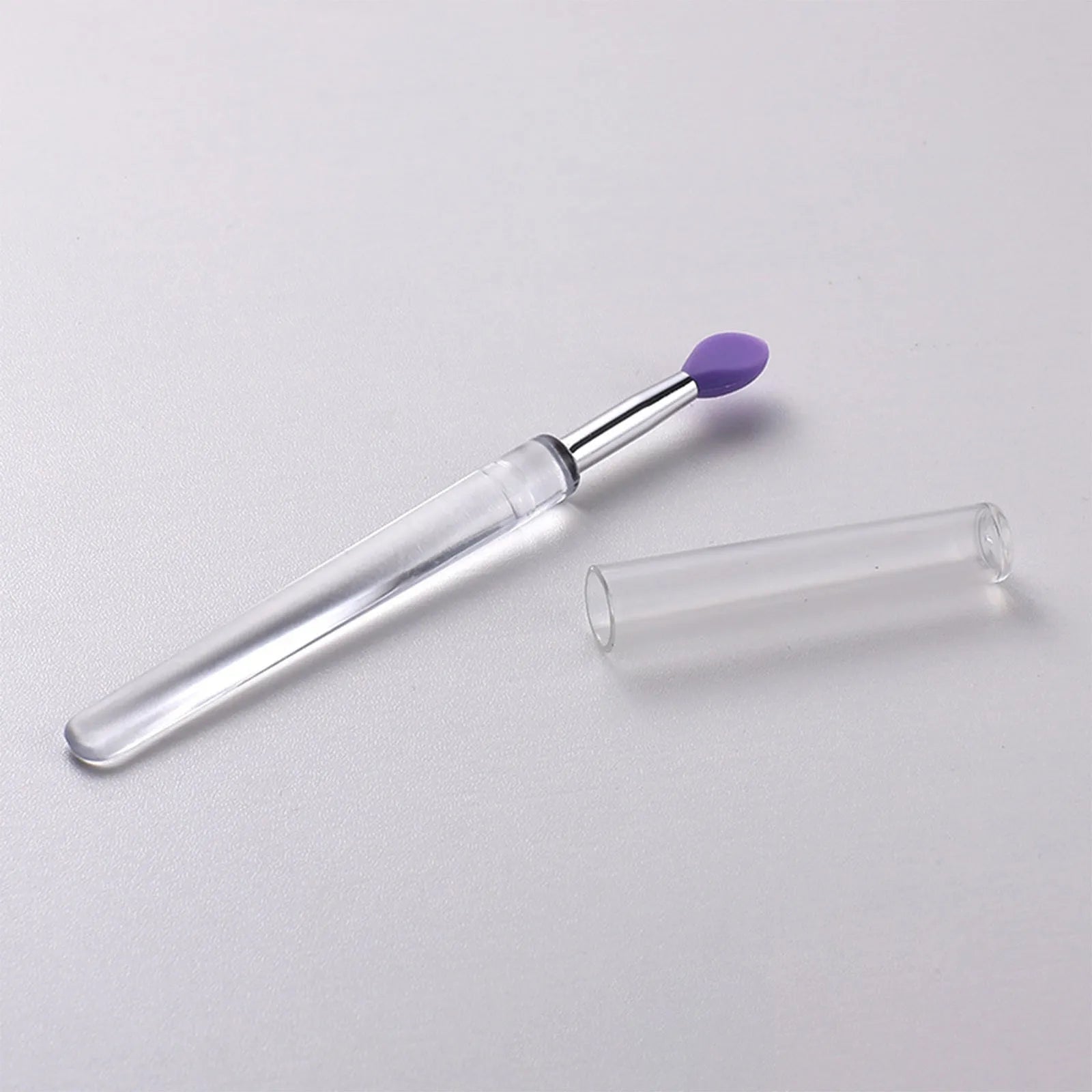 Set of reusable silicone lip brushes with protective caps in various colours