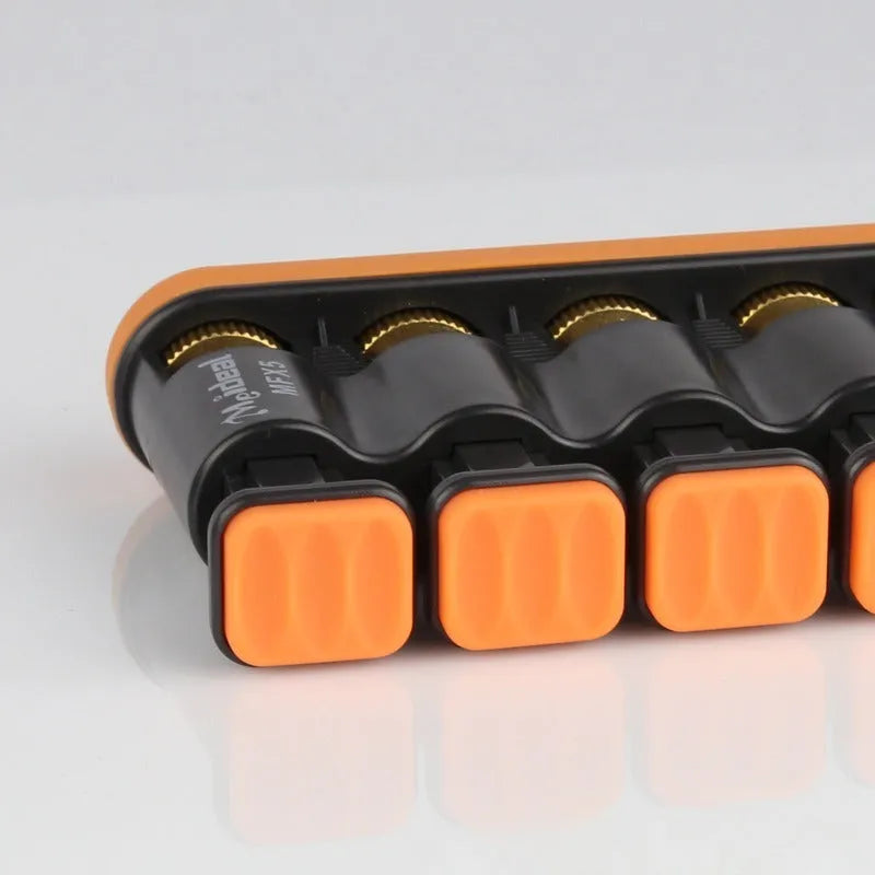 Grey and orange portable silicone finger trainer for musician hand muscle development.