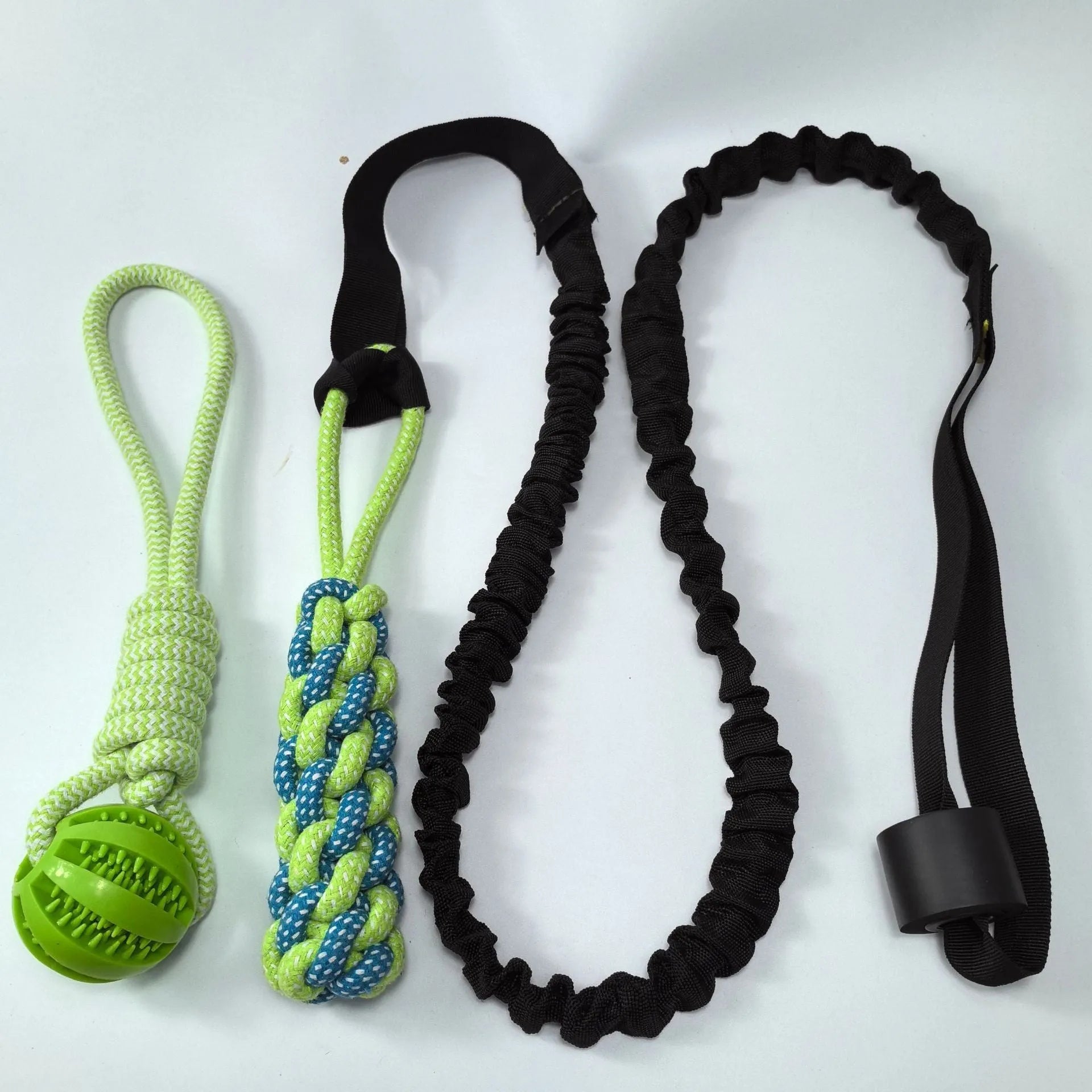 Green cotton rope dog tug toy with corncob design for interactive pull and chew play