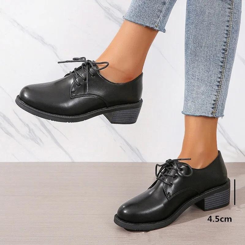 Black women's work shoes with thick chunky heel and low-top design