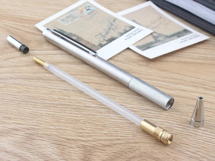 Metal automatic mechanical pencil shown with selectable lead size options including 0.5mm and 2.0mm.