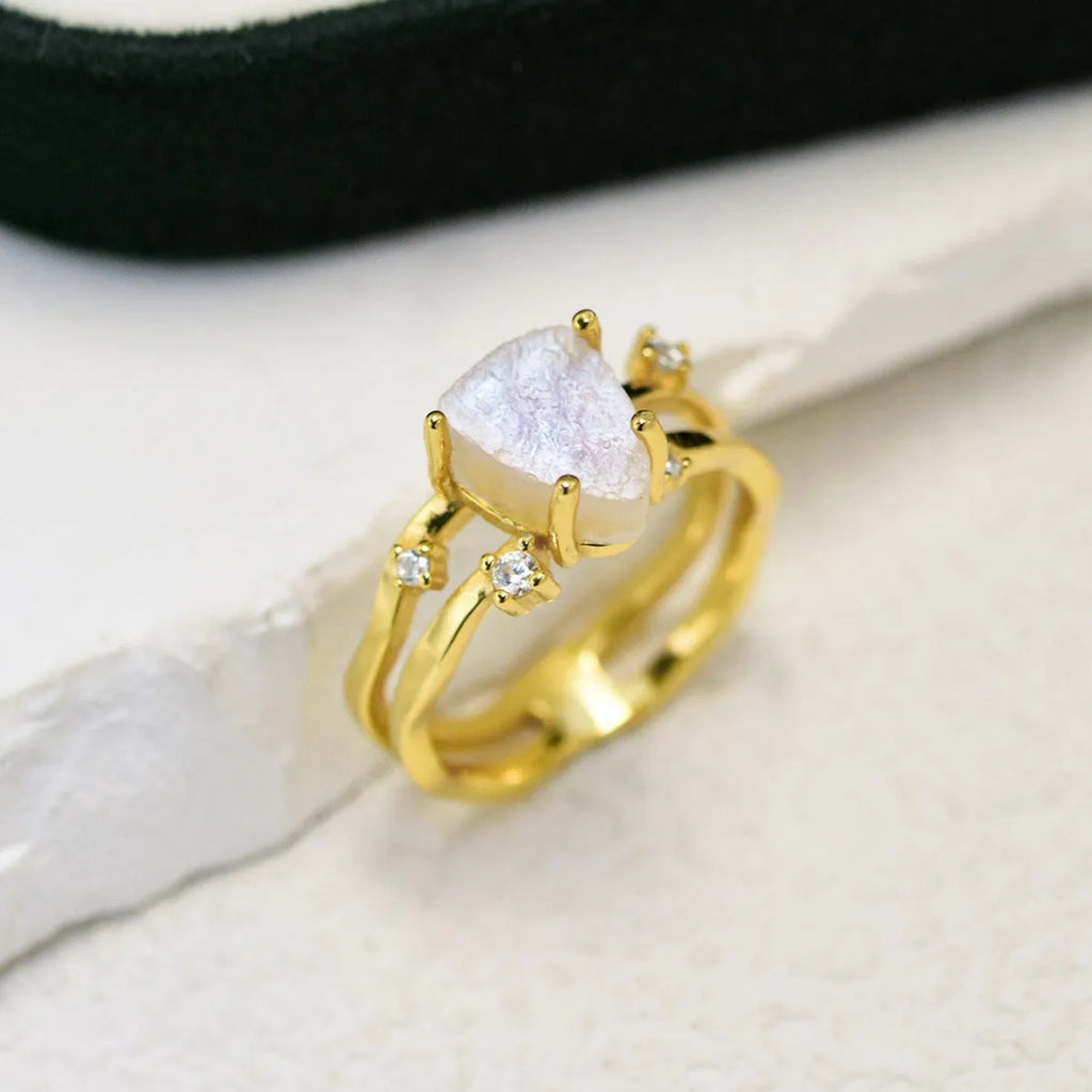 S925 silver ring with triangular shape and central moonstone in rose gold, white, or yellow gold finish.