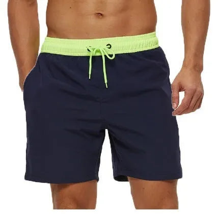 Men's blue training shorts with stitching waist detail and headband pocket for running and fitness