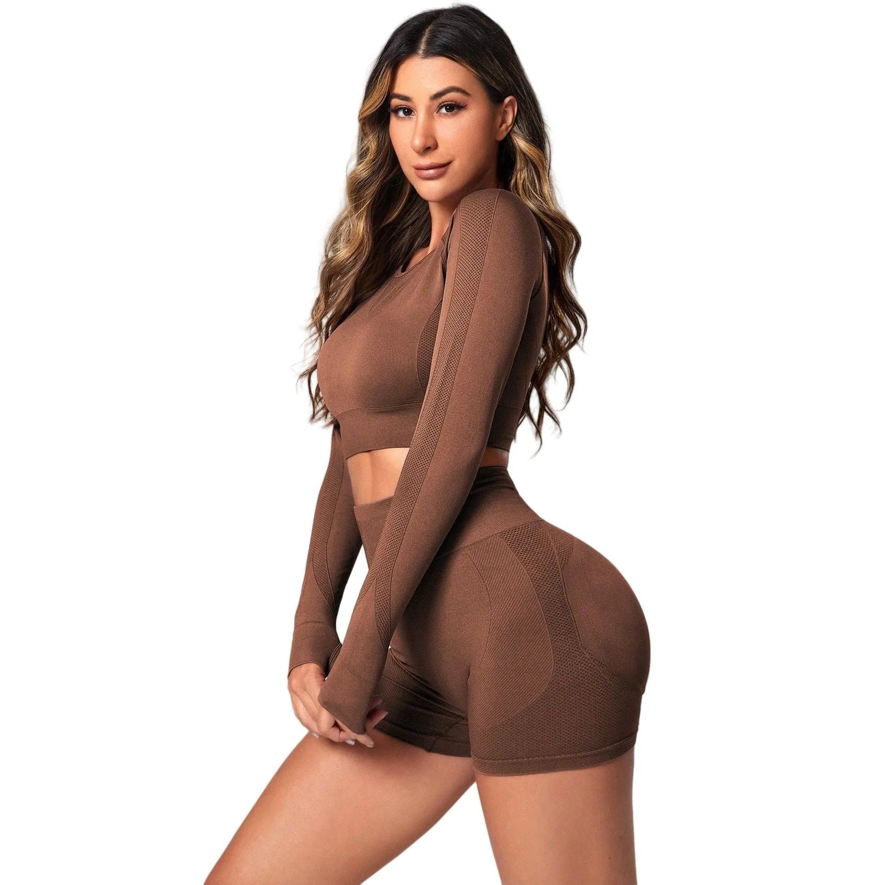 Women's black high waist yoga suit with long sleeve top and tight-fitting trousers on a mannequin.