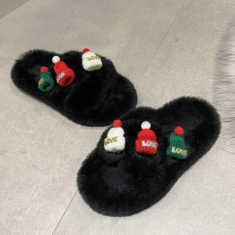 Women's Christmas hat slippers in faux plush with a rubber sole.