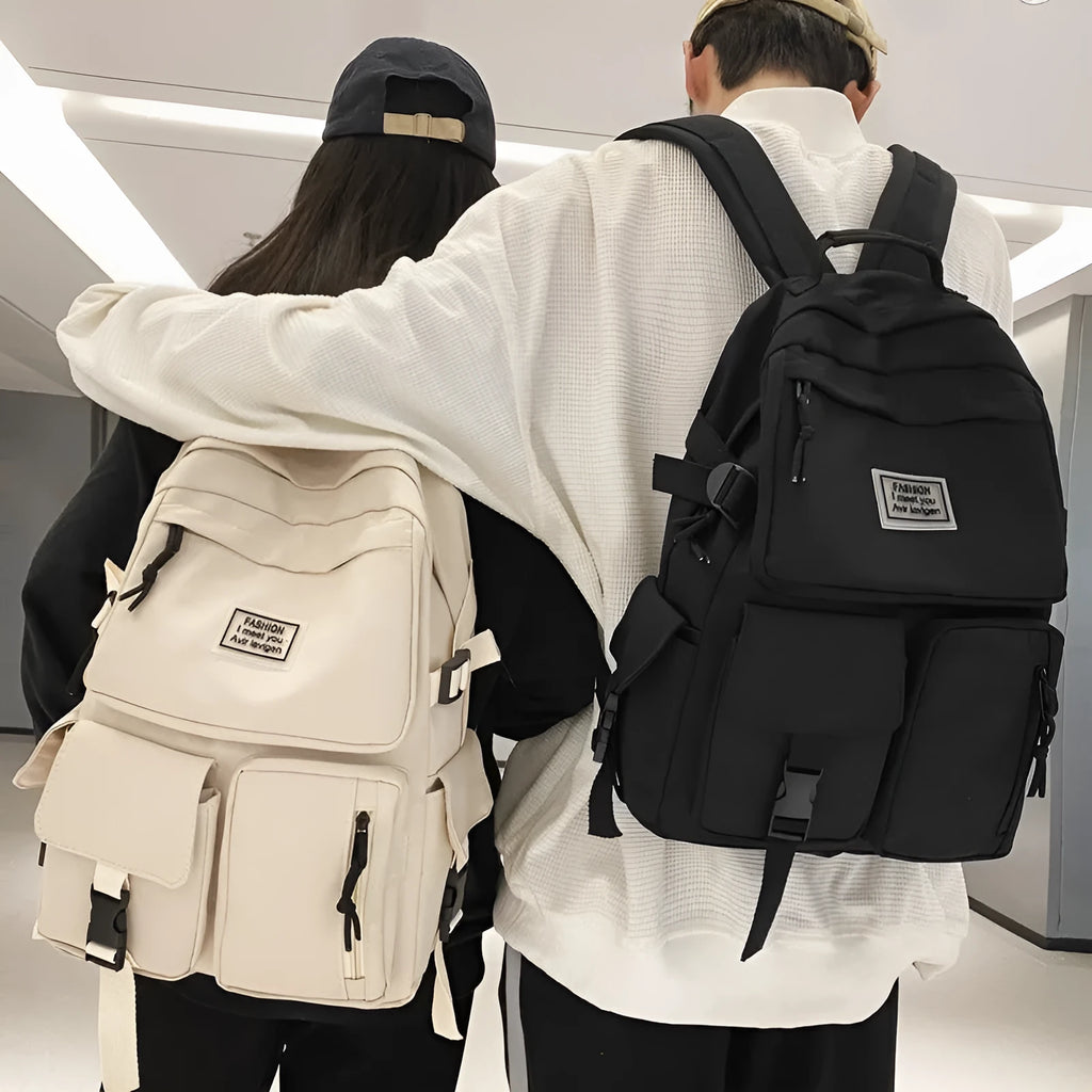 Black and white nylon student backpack with laptop compartment and three-dimensional pockets