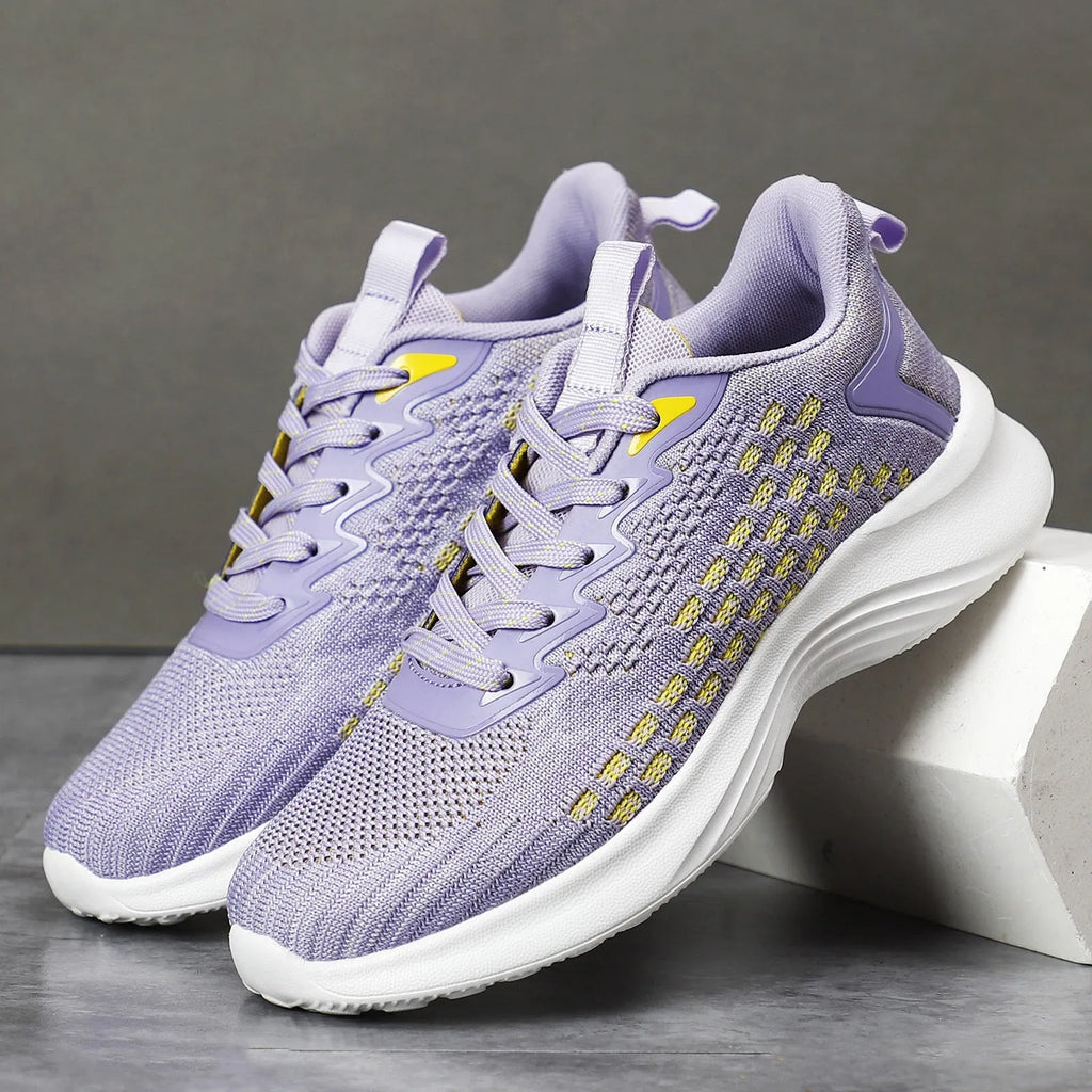 Women's lavender purple Flyknit running shoes with hollow elements and mesh lining
