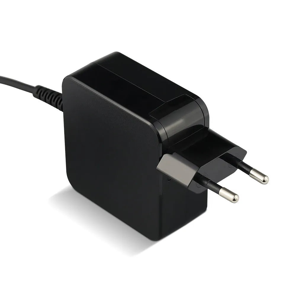 Black 45W laptop power adapter with EU and US plug options showing DC connector