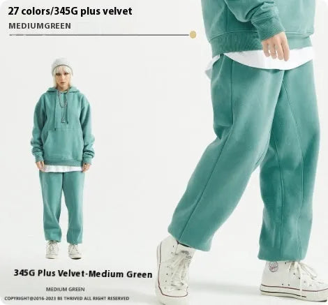 Men's solid colour velvet sweatpants with ankle banding in mid waist design