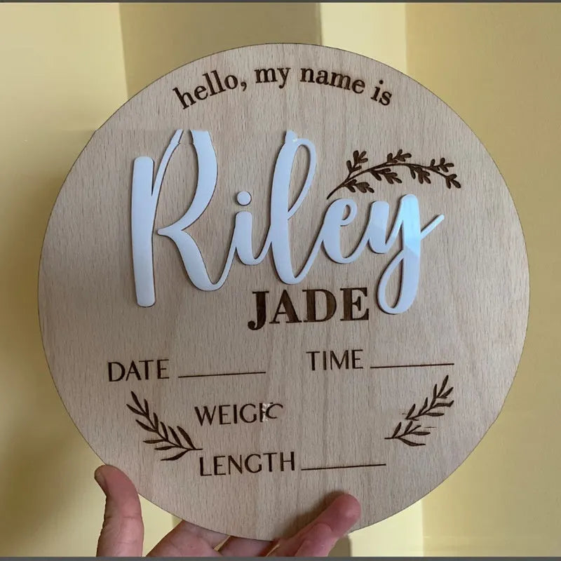 Square wooden baby name plaque showing birth information, 15 cm wide