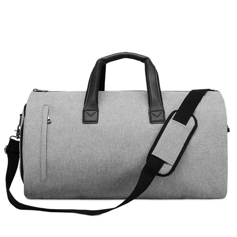 Light grey oval travel bag with multiple internal compartments for organisation.