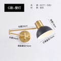 Modern minimalist double-section rocker arm wall lamp showing articulated arm positioning
