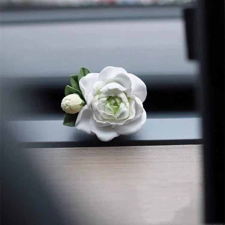 Solid jasmine car perfume for air outlet with gypsum base measuring 5 by 4.5cm