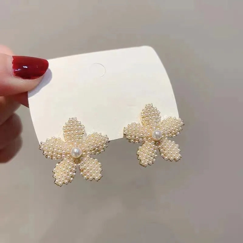 Korean-style gold pineapple starfish pearl alloy earrings with electroplated finish and gem inlay.