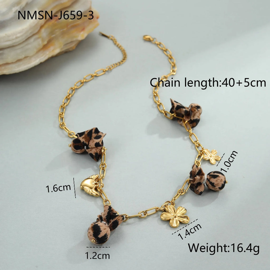 Stainless steel necklace with leopard, heart and flower pendant on adjustable 41-50cm chain