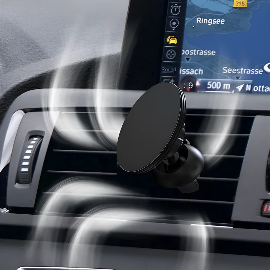 Black aluminium magnetic car phone holder clipped to car air vent