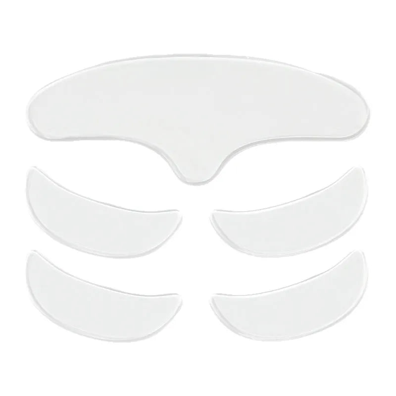 Five clear silicone anti-wrinkle face patches for forehead and eye area on white background