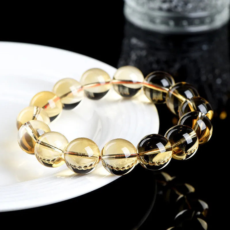 Natural citrine scattered bead and ball bracelet shown in selectable 7A or 6A grade colour.