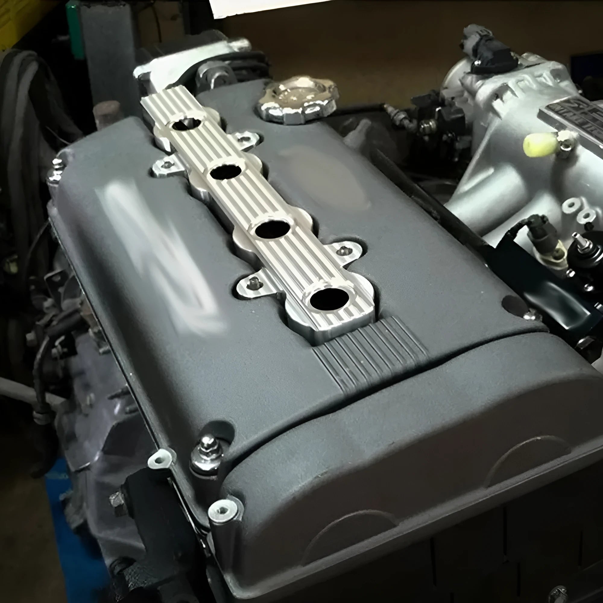 Aluminium engine hood replacement panel showing colour options: blue, red, and silver.