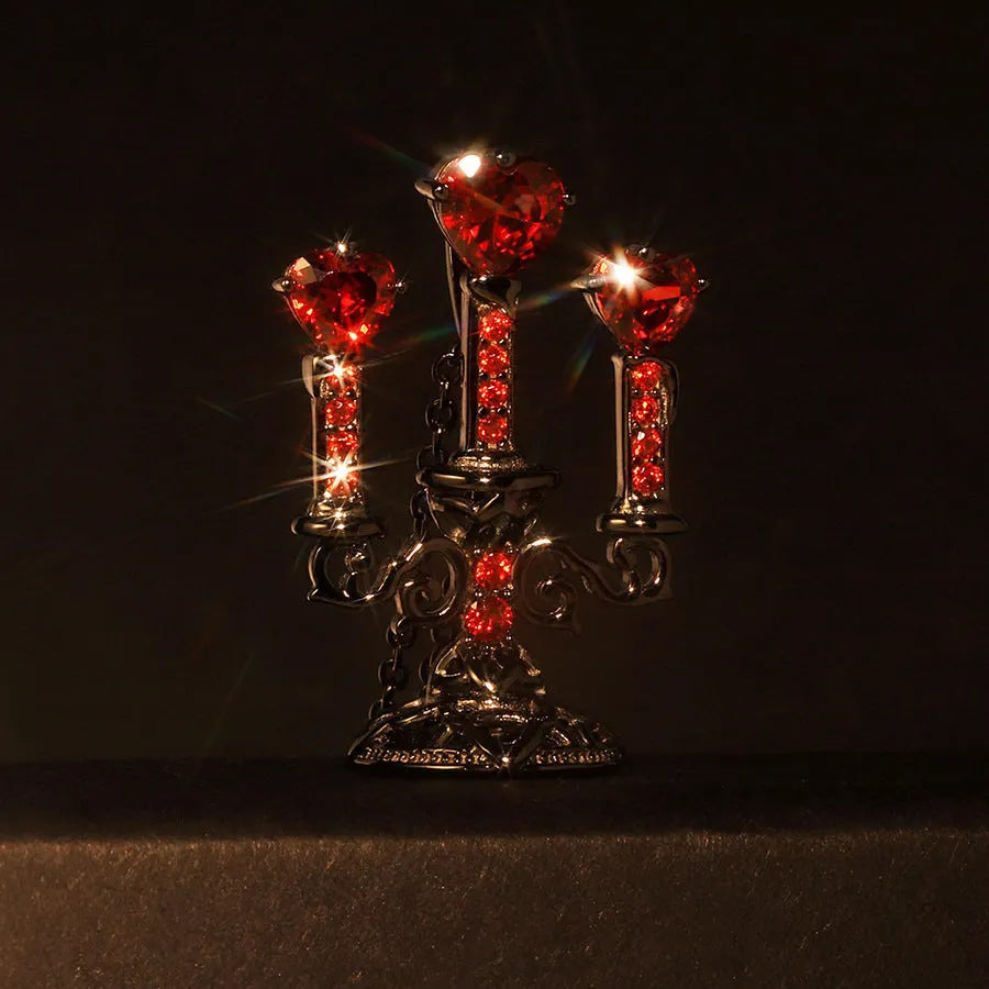 Women's vintage-style necklace with a detailed hollow candlestick pendant and cross chain in zinc alloy.